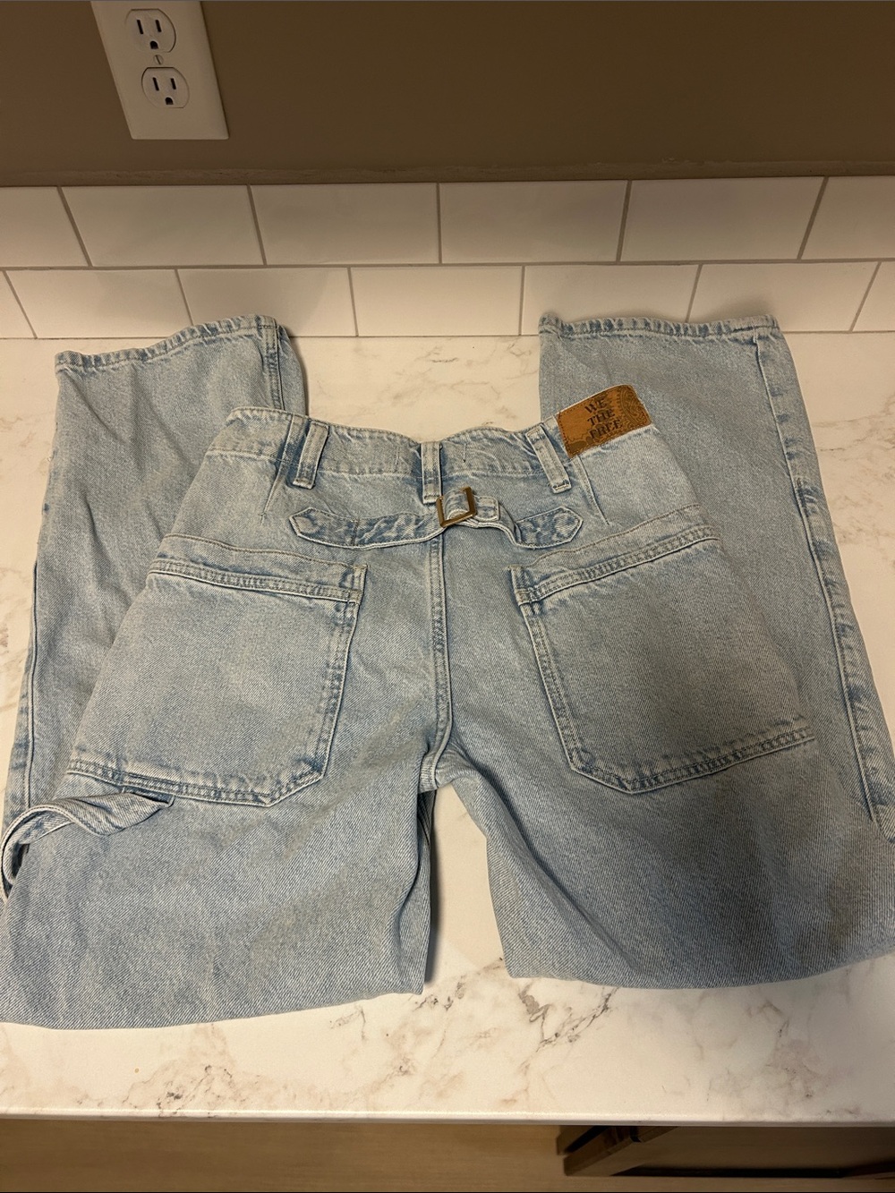 We the free Light Wash women’s Jeans with Back Buckle Detail